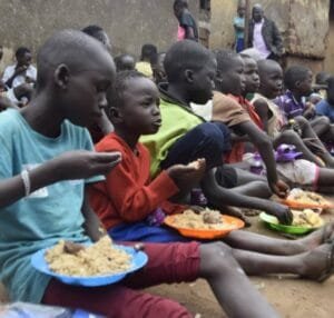 Feeding orphans and street children in Uganda Kampala